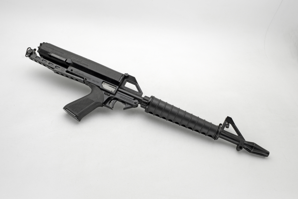 A Calico M-100 SEMI AUTO RIFLE CALIBER 22 LONG RIFLE THAT HAS A 100 ...