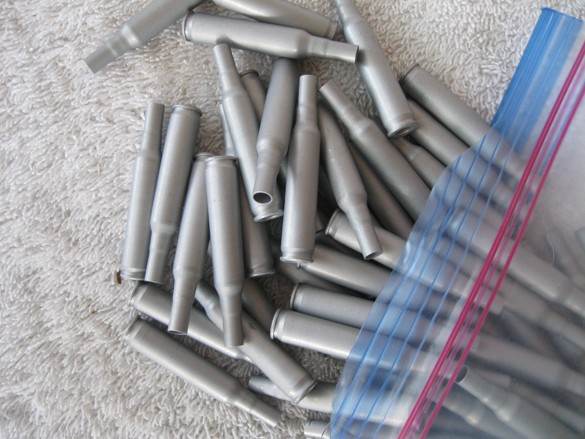 OMARK ALUMINUM CARTRIDGE CASES FOR 5.56 TRAINING BLANKS 50 COUNT PLUS 2