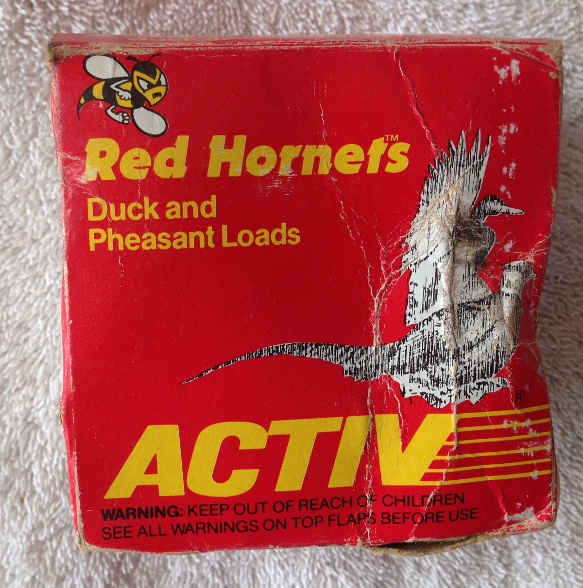 20-gauge-activ-2-3-4-1-7-1-2-yellow-plastic-shotgun-hulls-fired-red