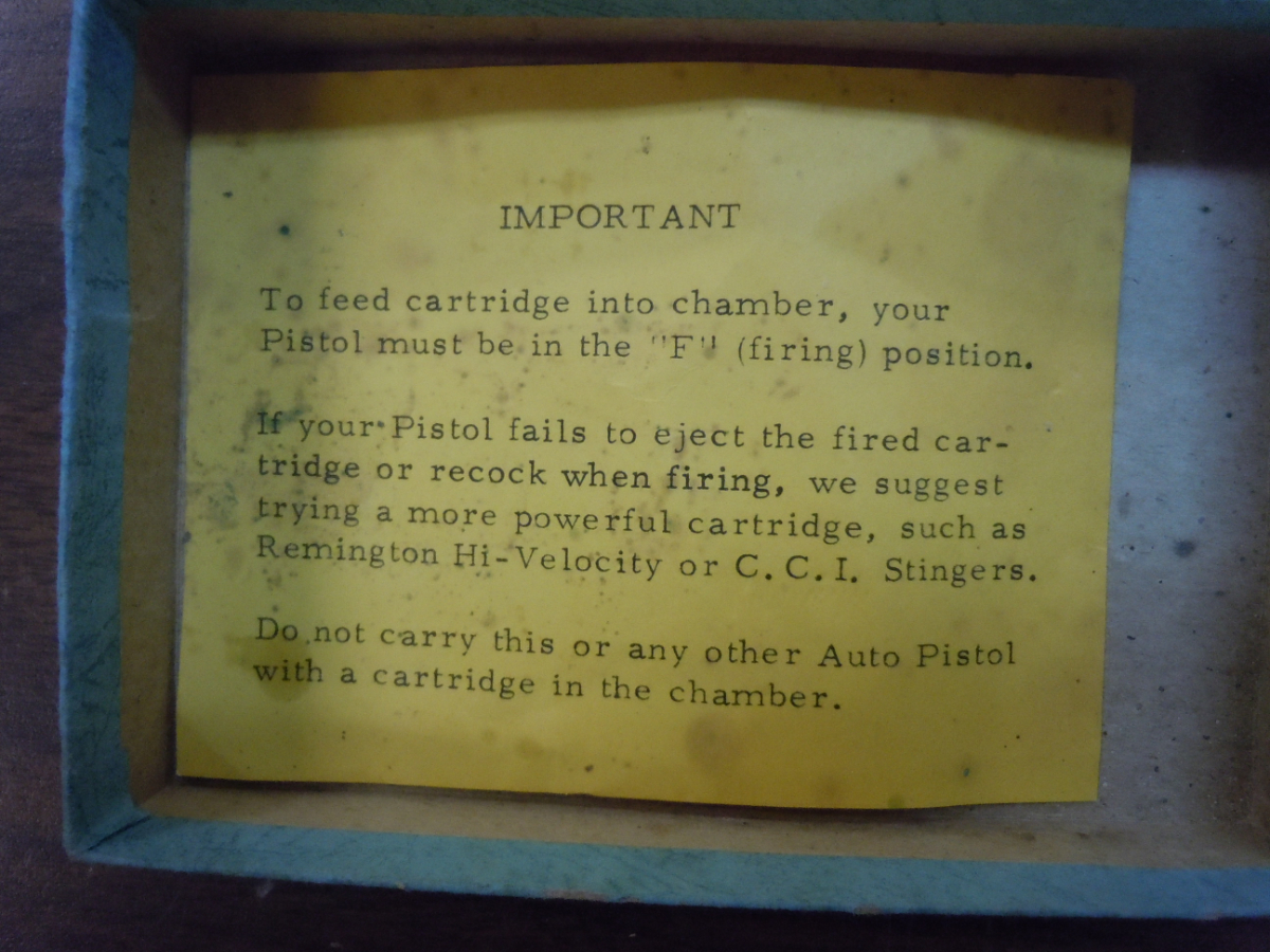 Jennings/Bryco Model J22 Chrome two 6 round magazines, Walnut grips