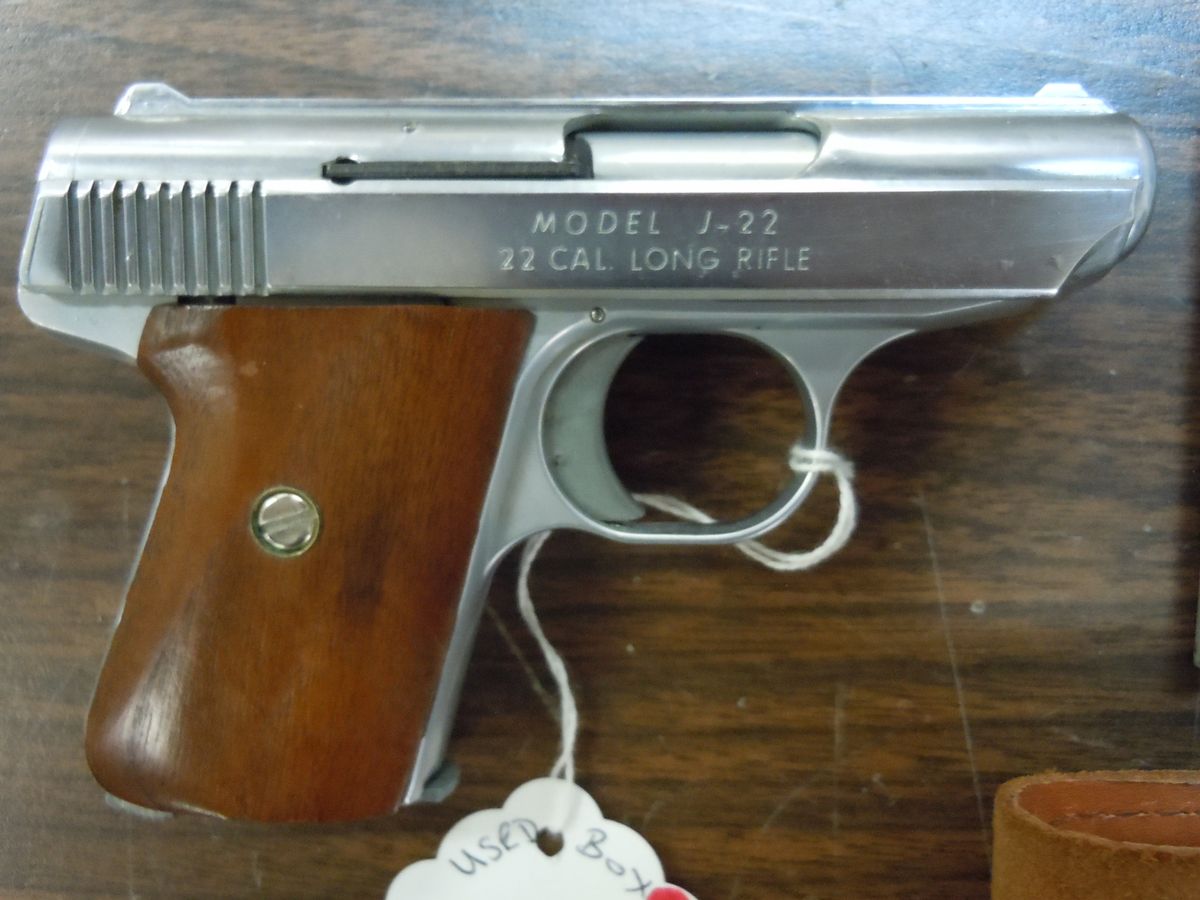 Jennings/Bryco Model J22 Chrome two 6 round magazines, Walnut grips