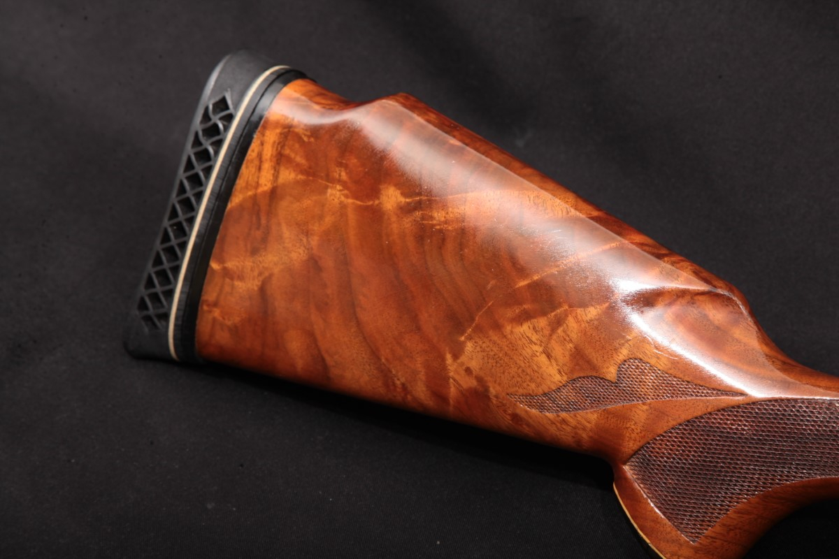 Remington Model 1100 Trap, Blue 30" VentRib GasOperated SemiAutomatic Shotgun & Ts Shell