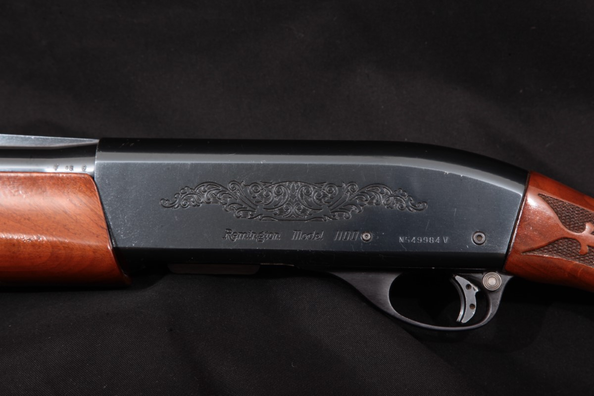 Remington Model 1100 Trap, Blue 30" VentRib GasOperated SemiAutomatic Shotgun & Ts Shell