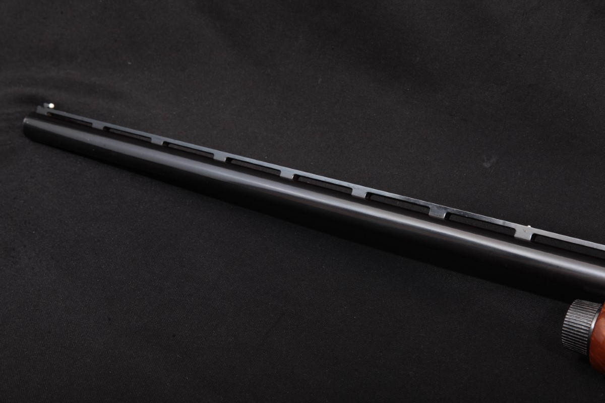 Remington Model 1100 Trap, Blue 30" VentRib GasOperated SemiAutomatic Shotgun & Ts Shell