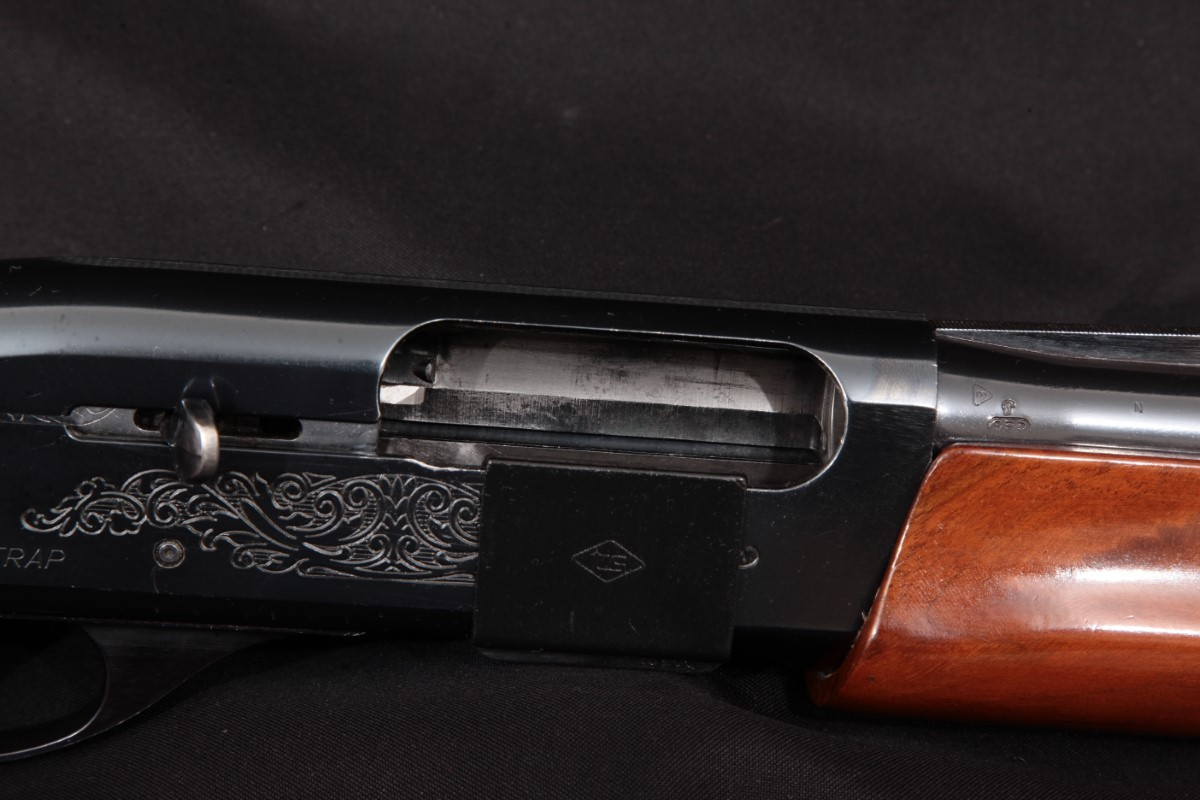 Remington Model 1100 Trap, Blue 30" VentRib GasOperated SemiAutomatic Shotgun & Ts Shell
