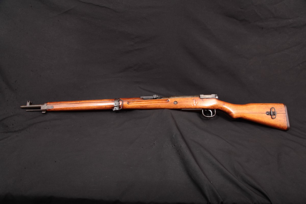 An Arisaka Type 99 Short Rifle that is complete with its Flower intact ...