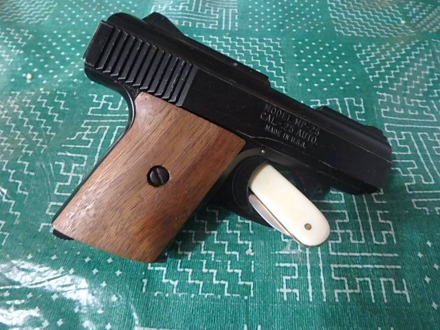 RAVEN ARMS 25 CAL RAVIN ARMS SEMI AUTO WOOD GRIPS