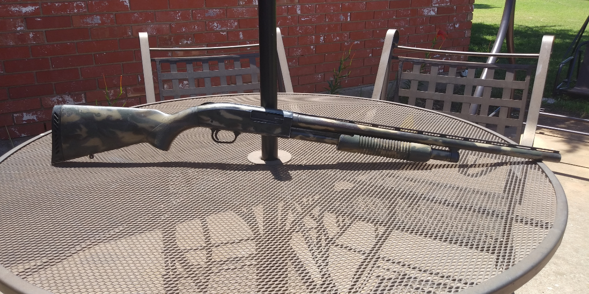 Mossberg 500 factory camo, aftermarket rust, good clean bore, accu