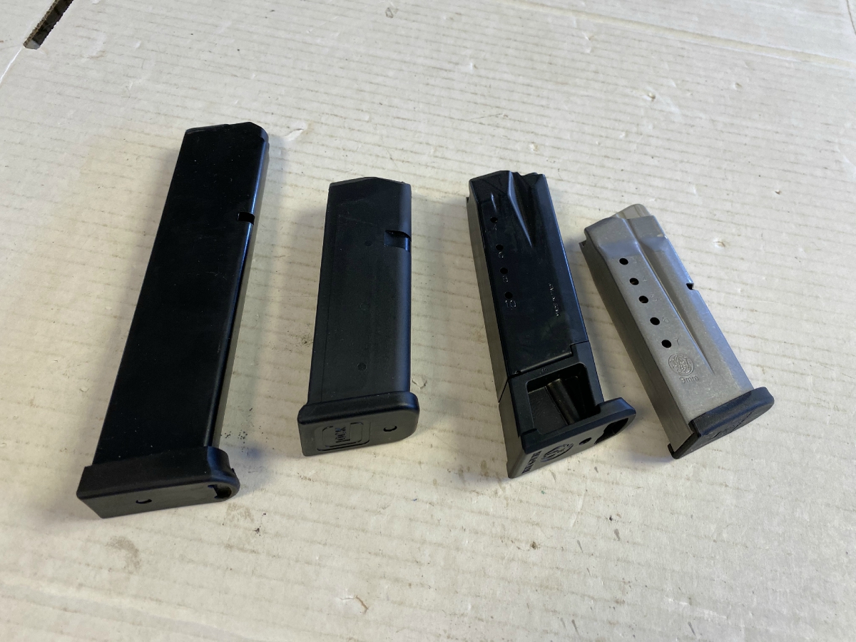 FOUR ASSORTED PISTOL MAGAZINES RUGER, S&W, PMAG TAURUS AND GLOCK NICE!!