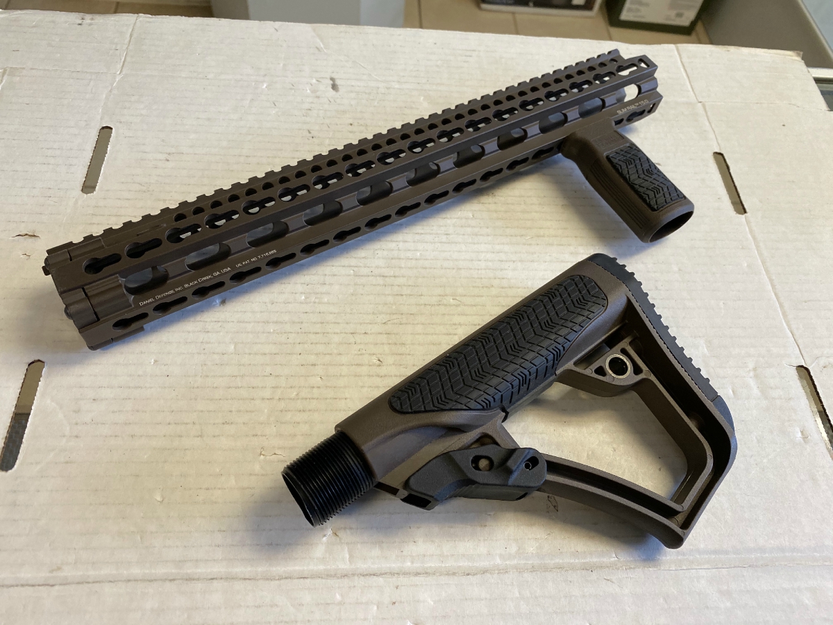 DANIEL DEFENSE QUAD RAIL VERTICAL HAND GRIP AND ADJUSTABLE BUTT STOCK