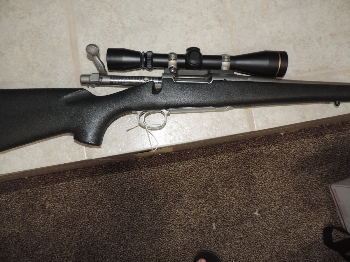 Remington 7 In 7mm08 Stainless Rifle With Leupold Vari X 2 Scope 7mm